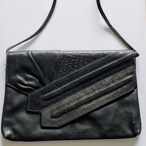 Jagged little pleather purse